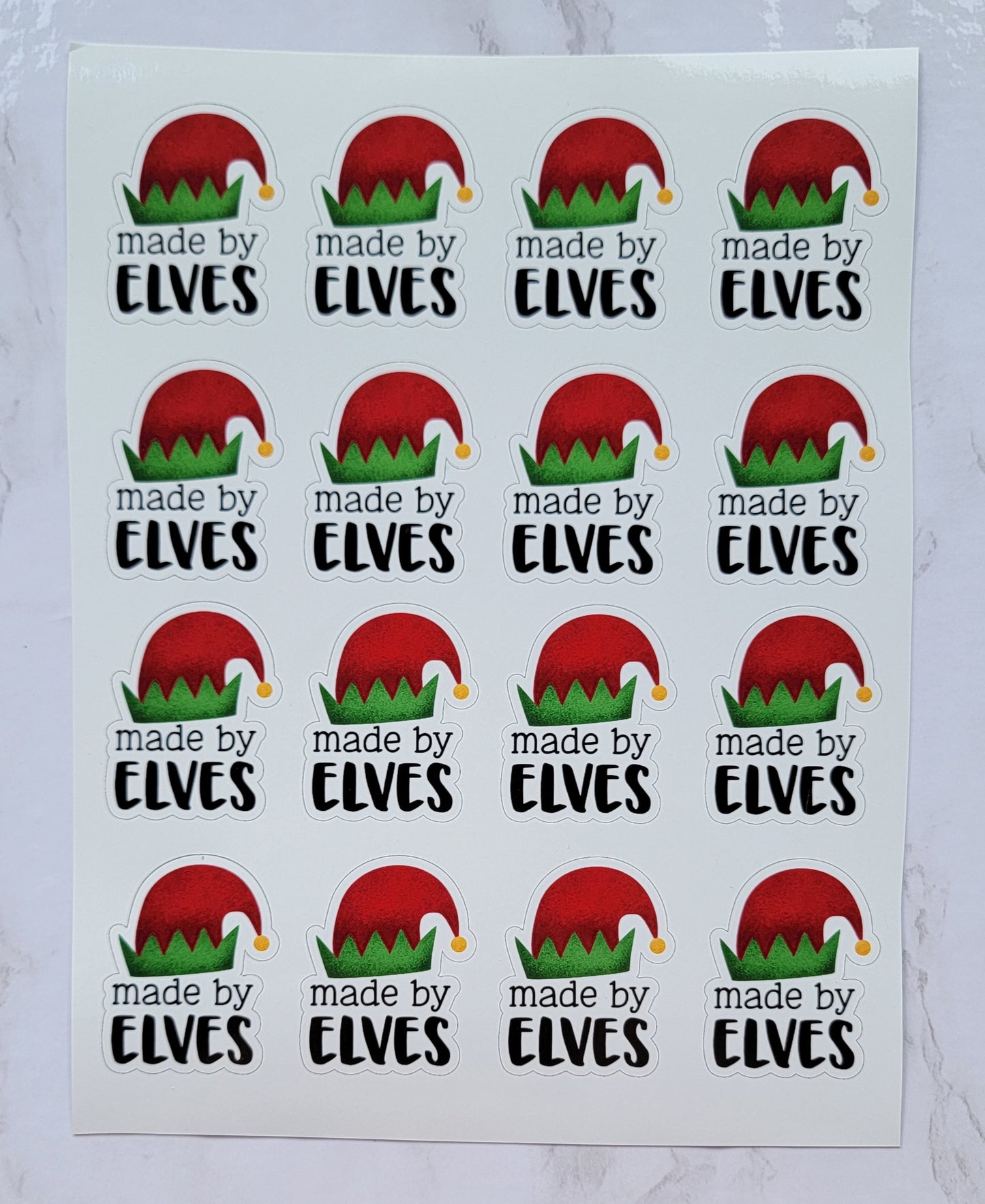 Christmas Theme - "Made By Elves" - Red & Green Elf Hat w/ White Background - Waterproof Sticker Sheet